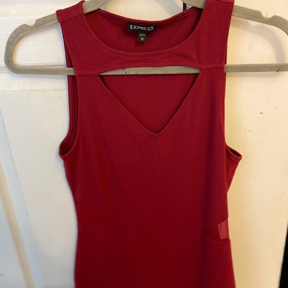 Red tank with front cut outs.